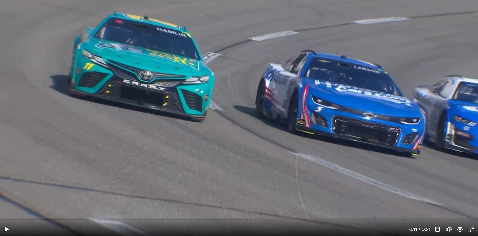(L-R) Denny Hamlin (#11) and Kyle Larson (#5) race each other during the NASCAR Cup Series 