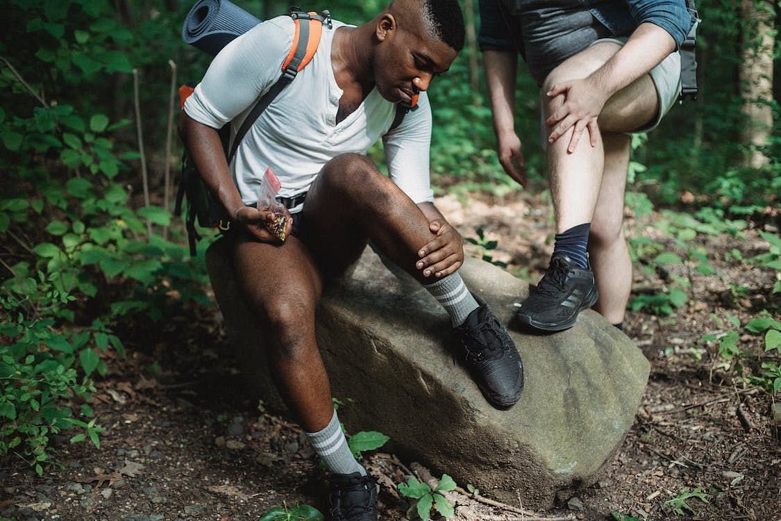 Tick bites can occur while participating in outdoor activities such as hiking, camping, or simply relaxing in your backyard (Kamaji Ogino/ Pexels)