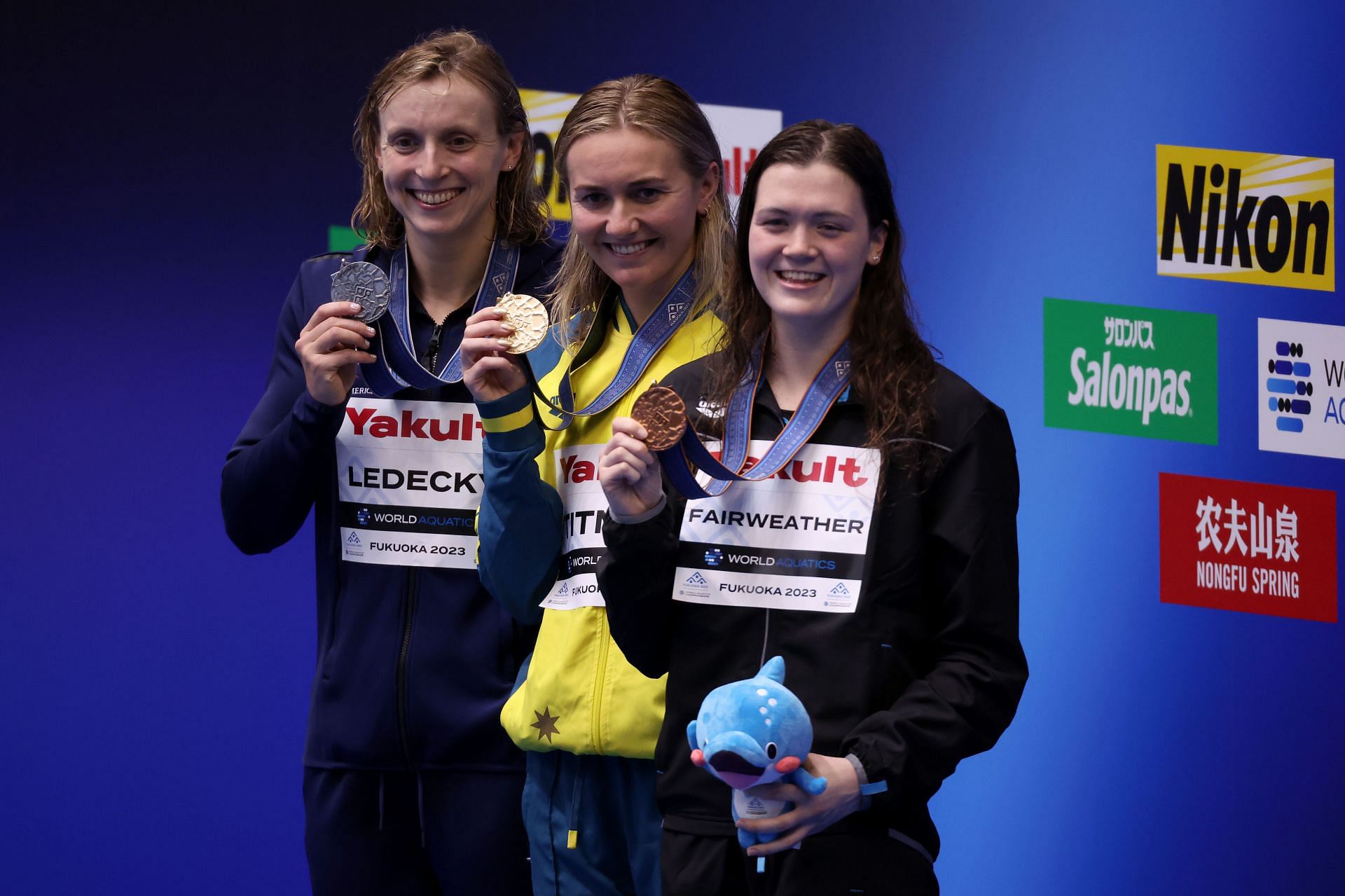 Silver medallist Katie Ledecky, gold medallist Ariarne Titmus, and bronze medallist Erika Fairweather at Fukuoka 2023 World Aquatics Championships