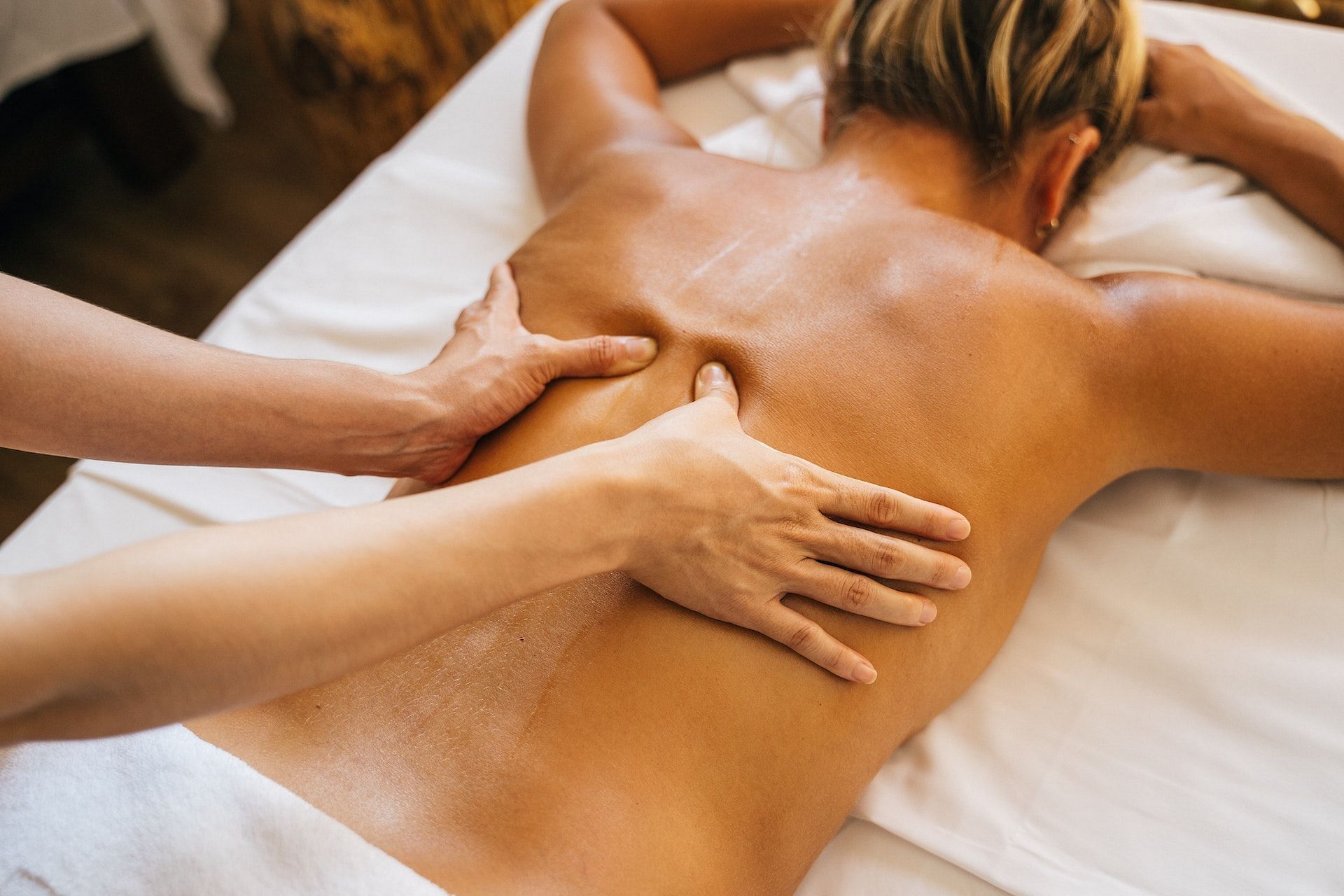 Massage can ease pain and inflammation. (Photo via Pexels/Anna Tarazevich)