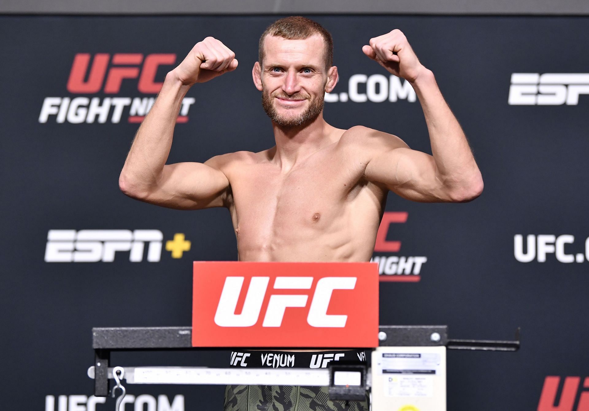 Davey Grant poses at the scale - UFC Fight Night: The Korean Zombie v Ige Weigh-in