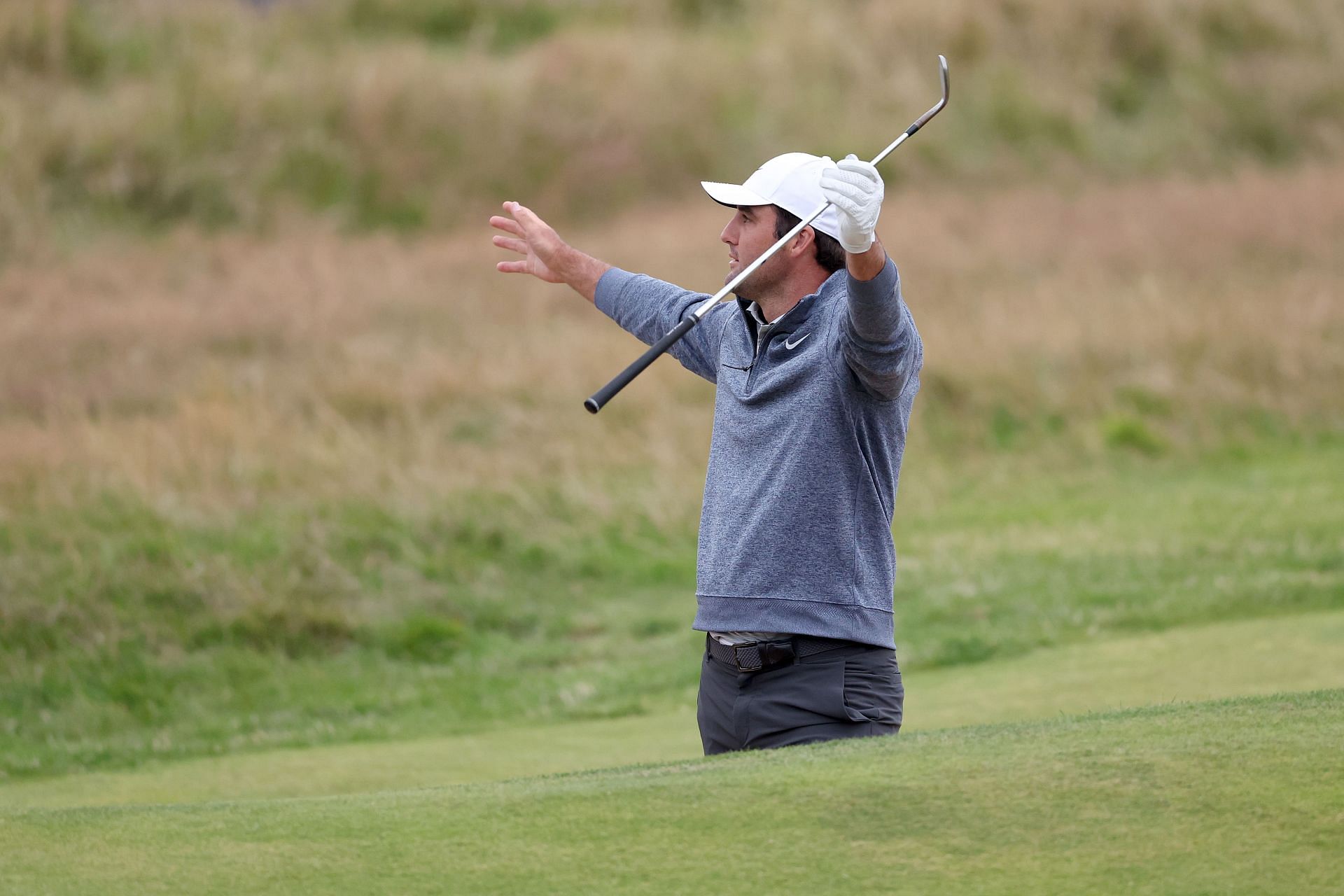 Scheffler celebrating his shot from the 18th hole bunker. The 151st Open Championship (Image via Getty).