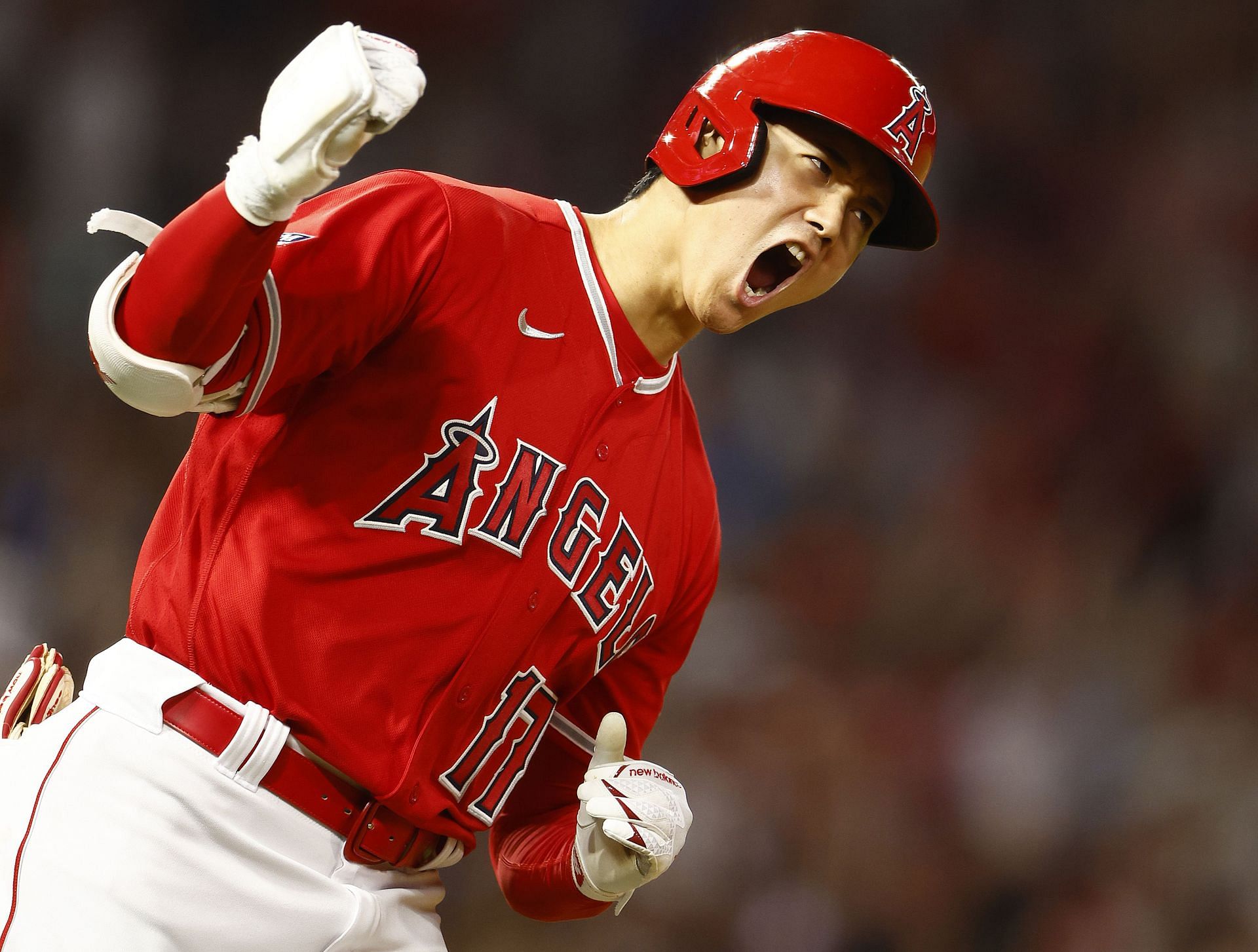 Shohei Ohtani of the Los Angeles Angels reacts after hitting a home run against the New York Yankees.