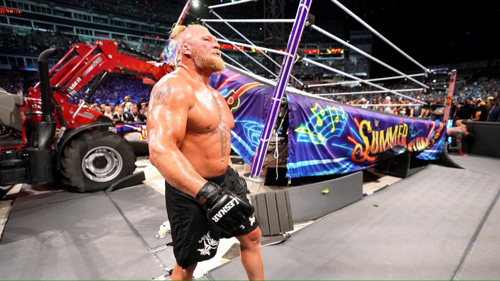 Brock Lesnar casually strolls around after destroying the ring at SummerSlam 2023.