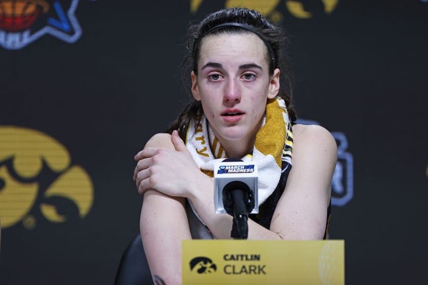 WNBA superstar Sabrina Ionescu gets a warm reaction from Iowa's Caitlin