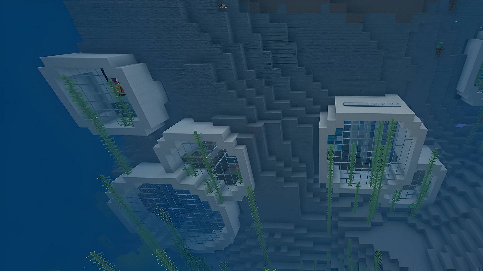 This Minecraft base interconnects several modules viewing the sea from a singular facing (Image via Razzleberries)