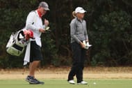 Stacy Lewis talks with her caddie, Travis Wilson during the third round of the 75th U.S. Women's Open Championship 2020