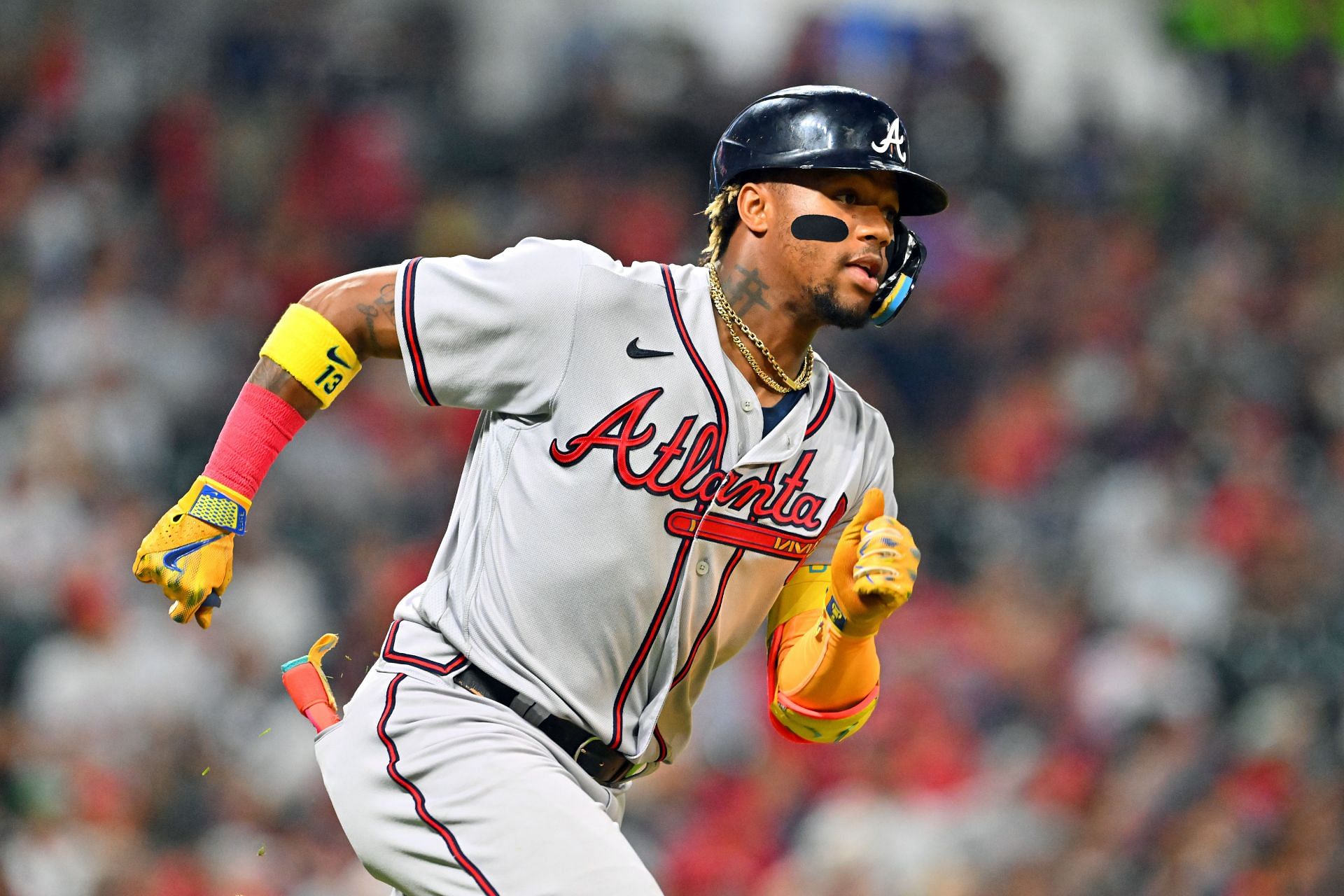 Ronald Acuna Jr. of the Atlanta Braves runs out a single against the Cleveland Guardians at Progressive Field