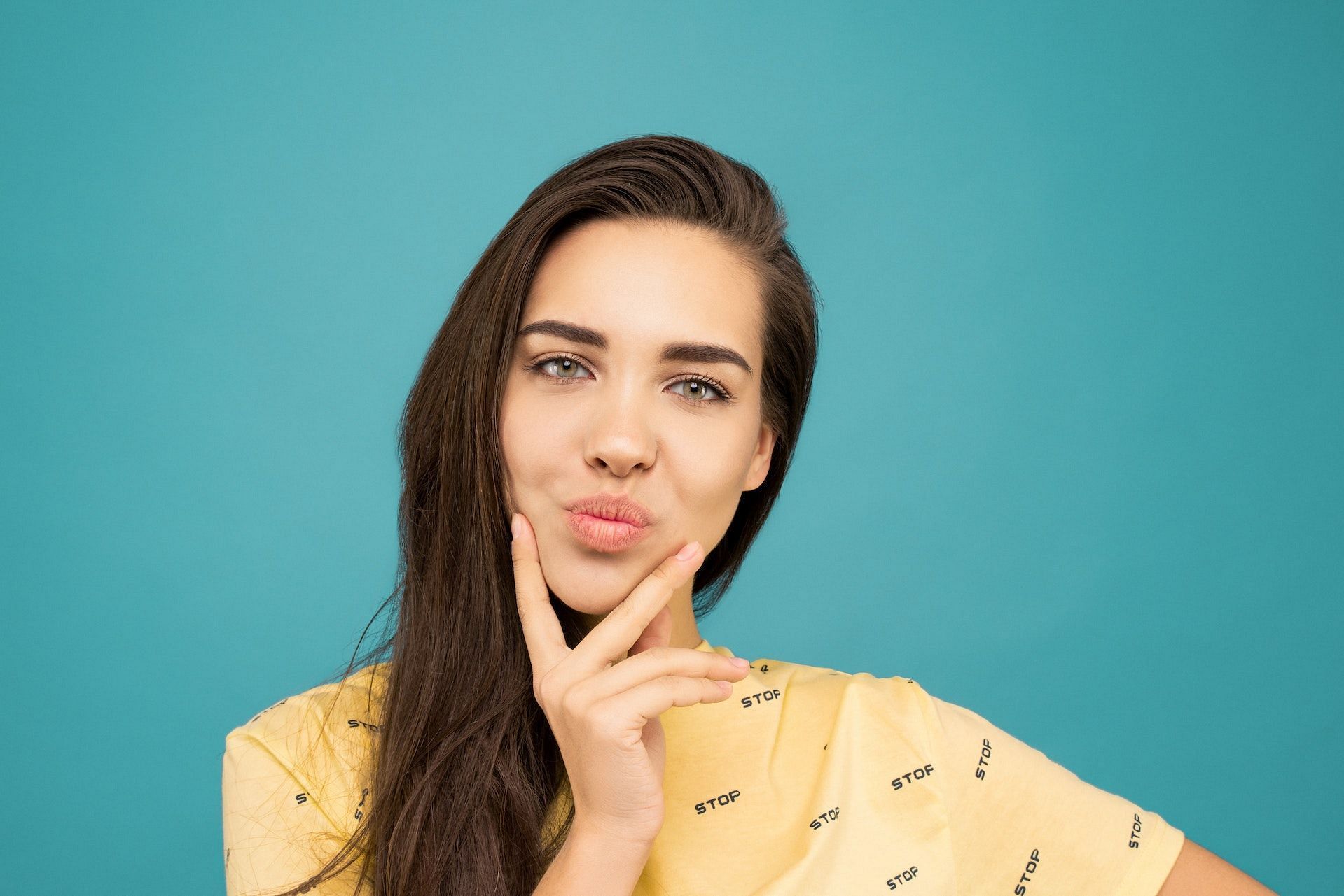 Face yoga for jowls works on the cheeks and the muscles around the lips. (Photo via Pexels/Sound On)