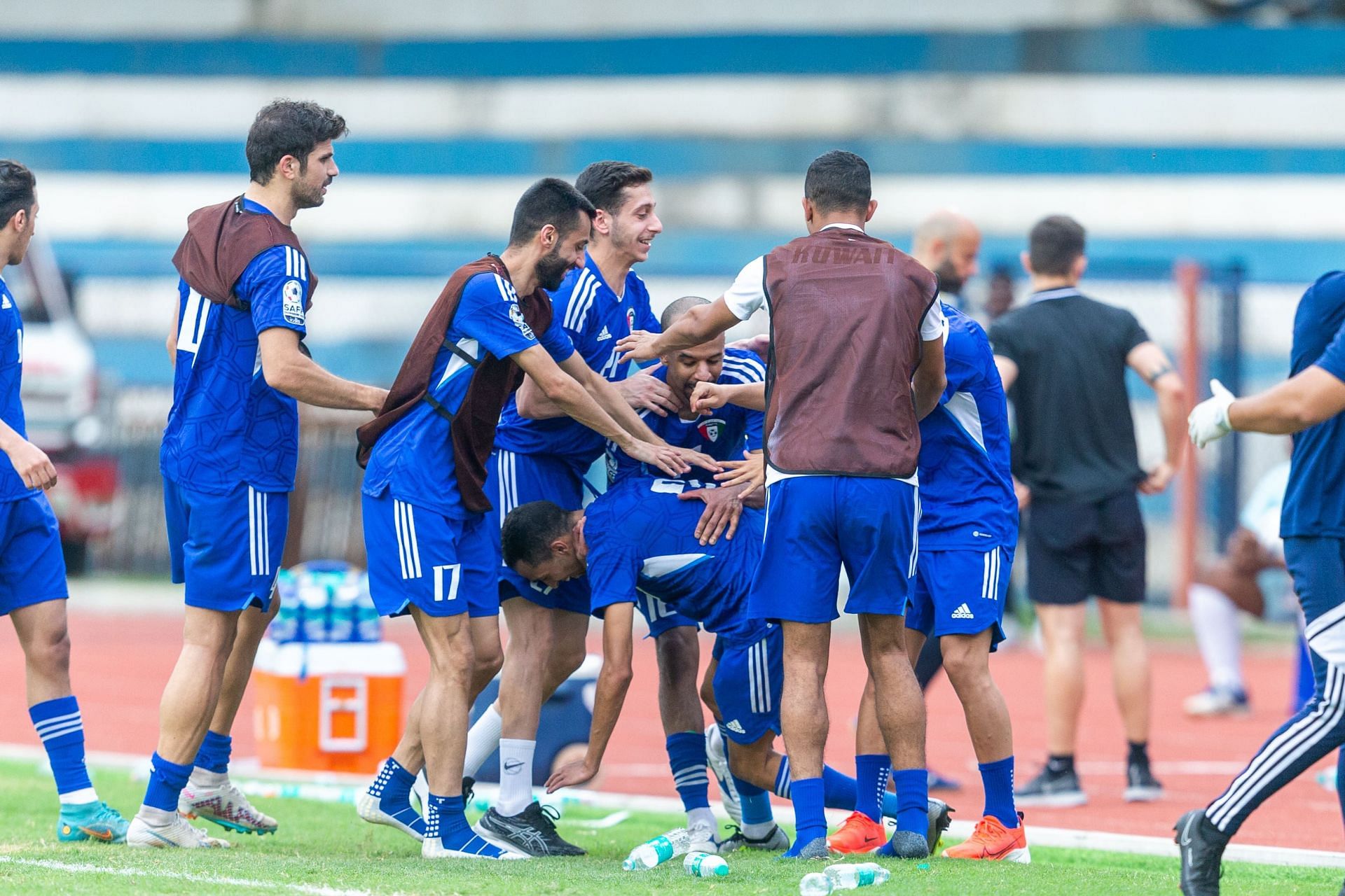 Kuwait players celebrate their goal against Bangladesh.