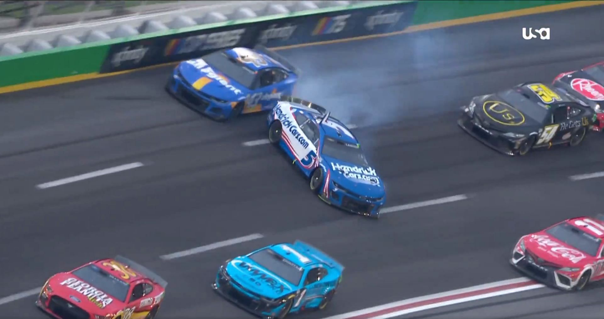 Kyle Larson getting spun around by Erik Jones in the Quaker State 400 (screengrab from NBC broadcast)