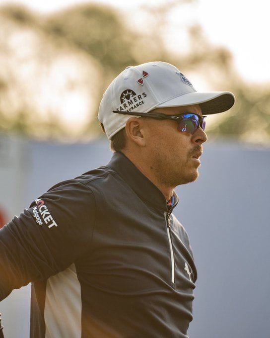 Why were PGA Tour golfers wearing red pins on Thursday at the 2023