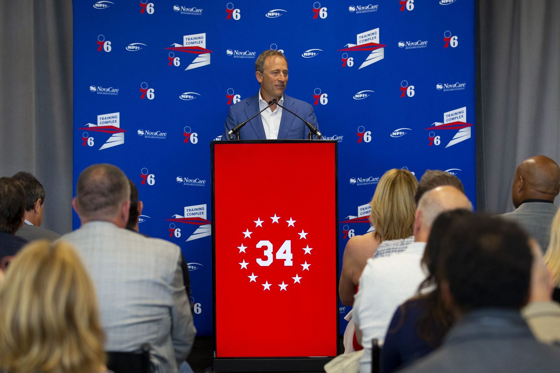 New Commanders owner fields questions as his Philadelphia 76ers Unveil Charles Barkley Sculpture