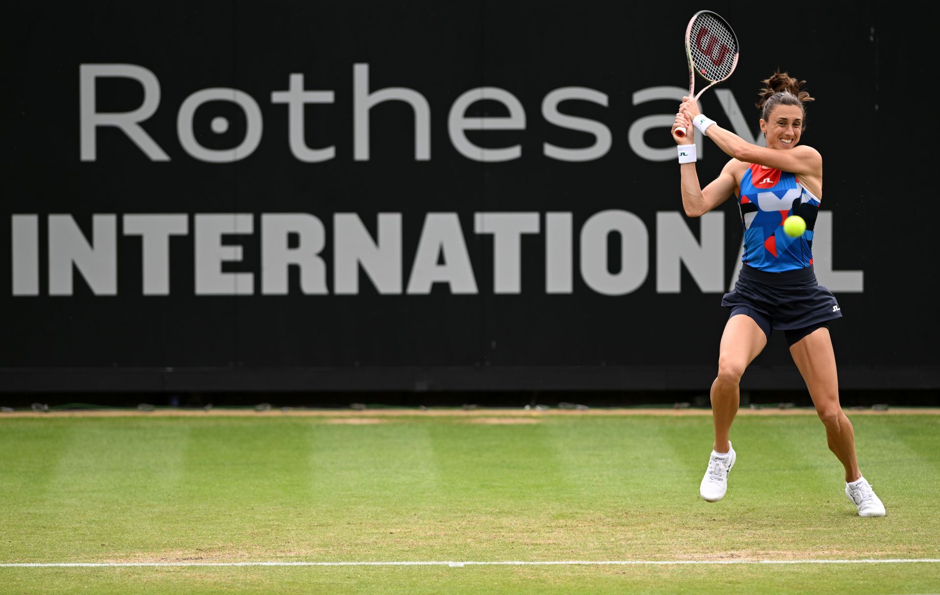 Petra Martić plays a forehand at Rothesay International Eastbourne