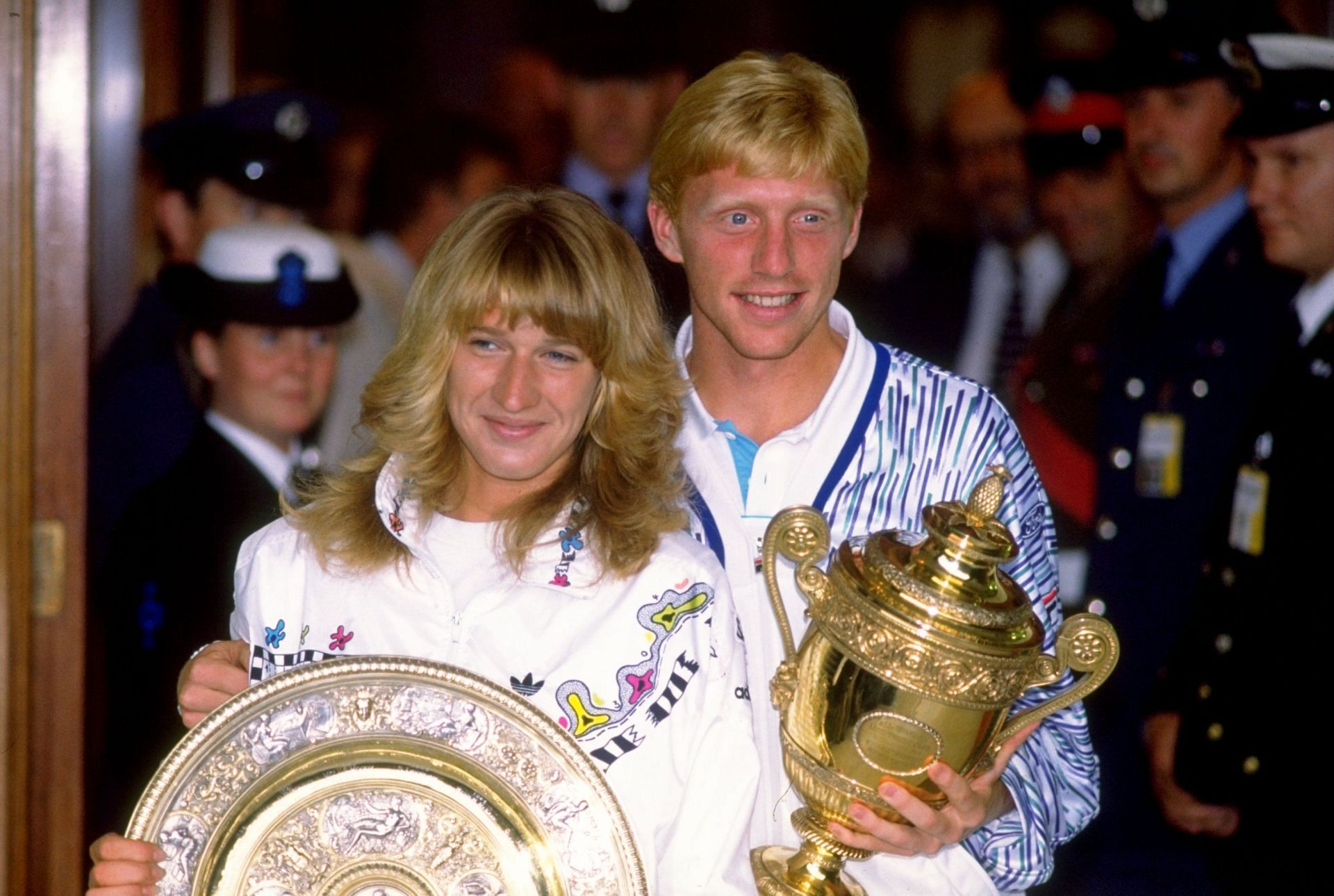 Steffi Graf and Boris Becker with their 1989 Wimbledon trophies