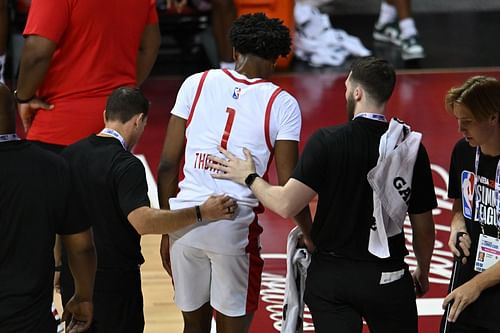 Amen Thompson of the Houston Rockets walking back to the locker room after his injury.