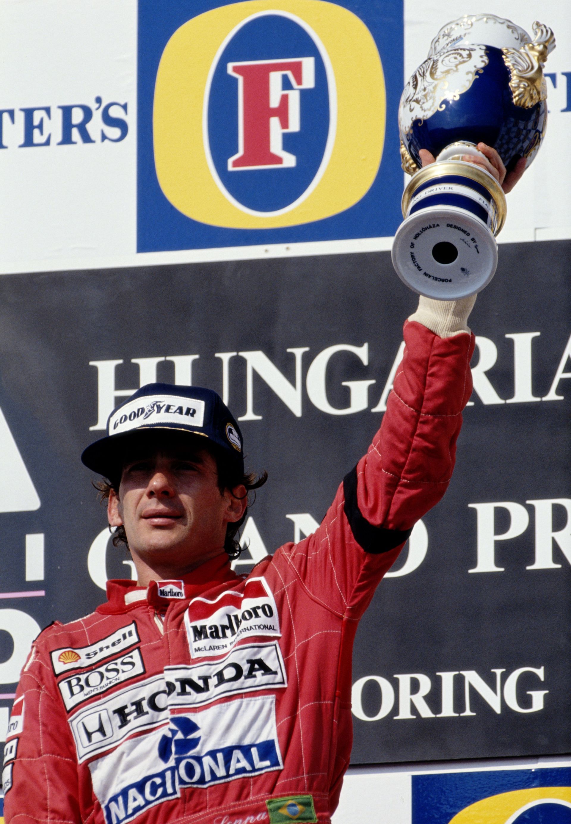 Ayrton Senna celebrates winning the 1991 Hungarian Grand Prix (Photo by Pascal Rondeau/Getty Images)