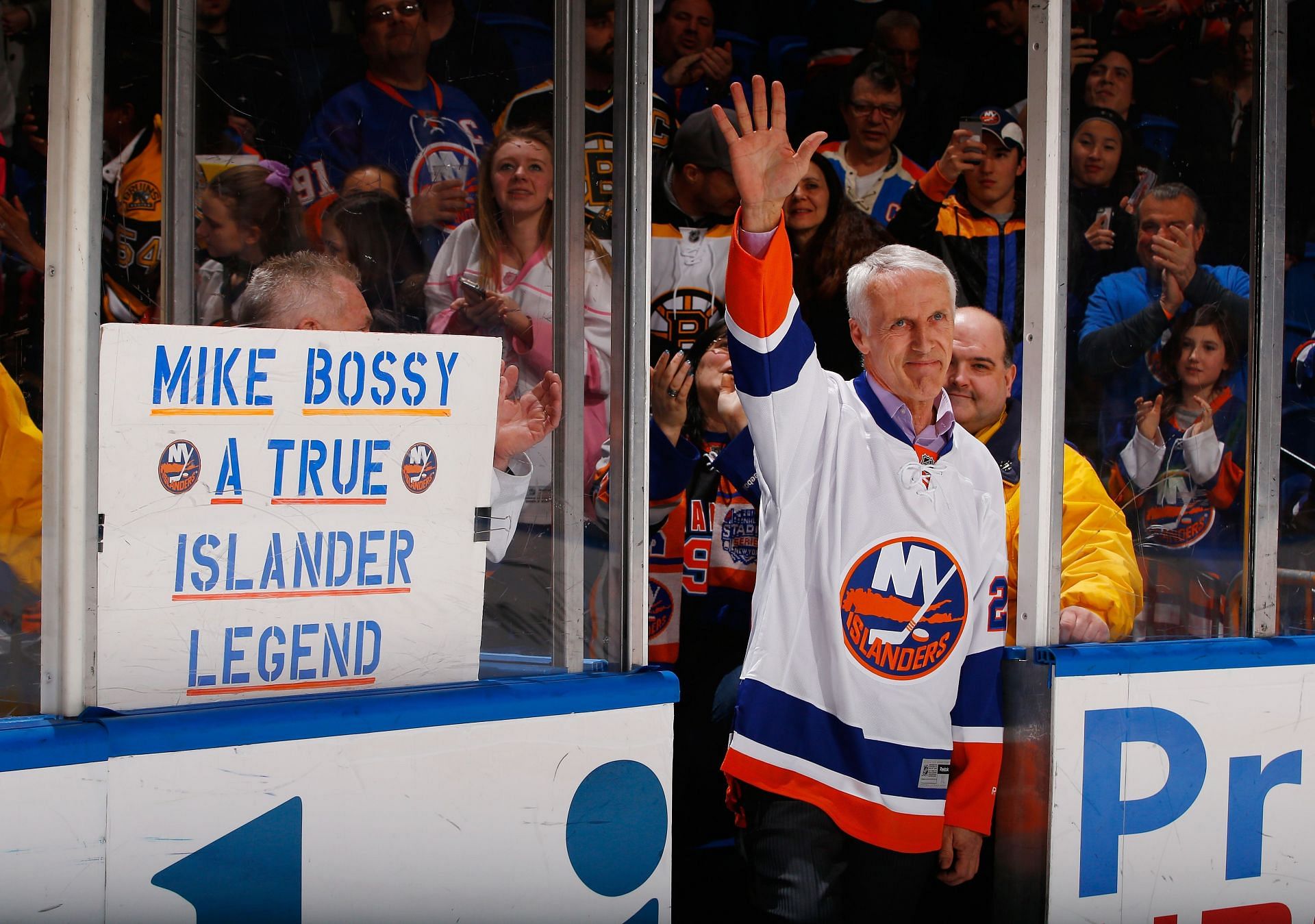 Mike Bossy retired due to chronic knee and back pains