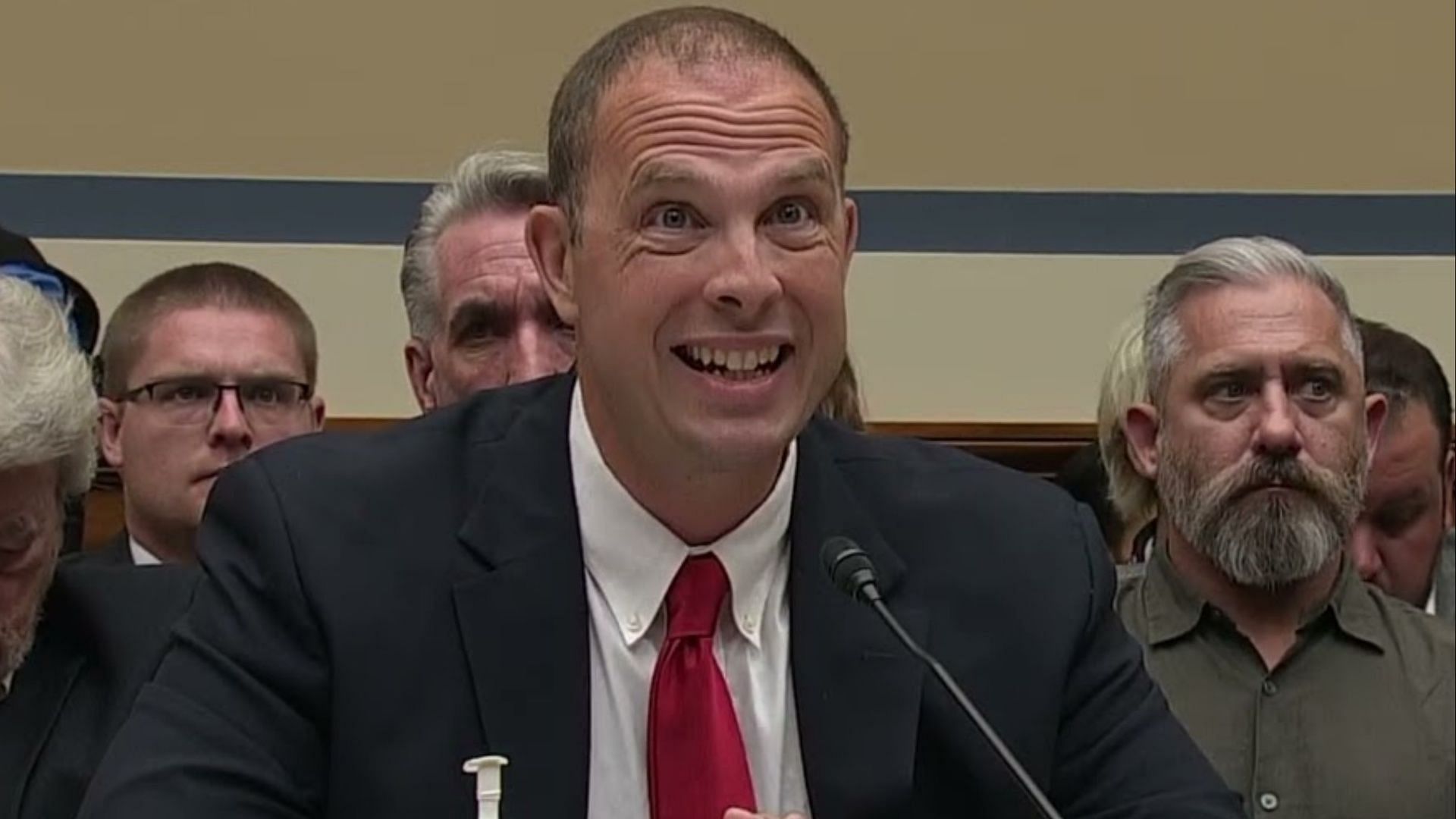 David Grusch is a former intelligence official of the US government. (Image via YouTube/C-SPAN)