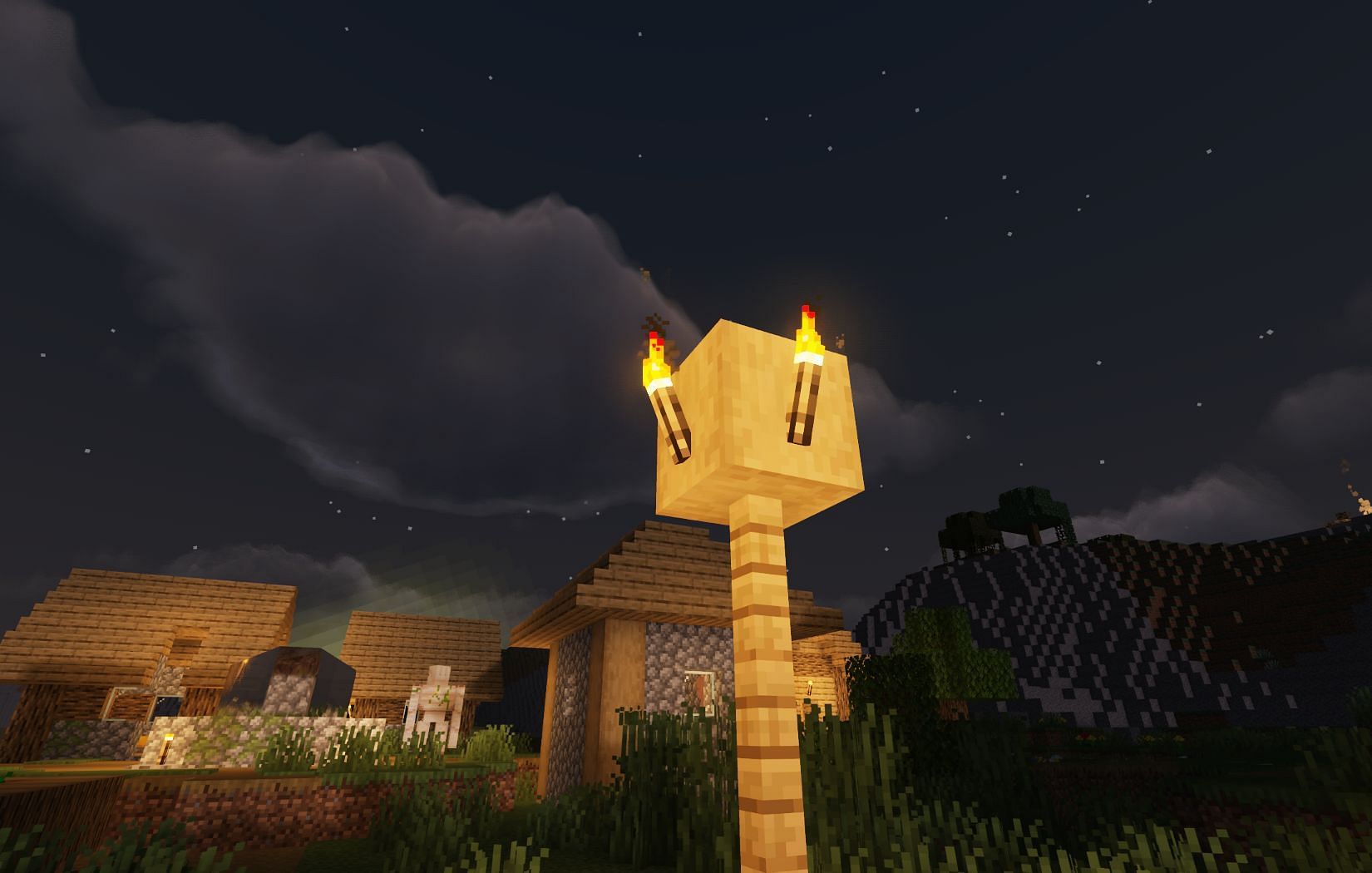 Torches are still the original go-to when it comes to lighting the place (Image via Mojang)