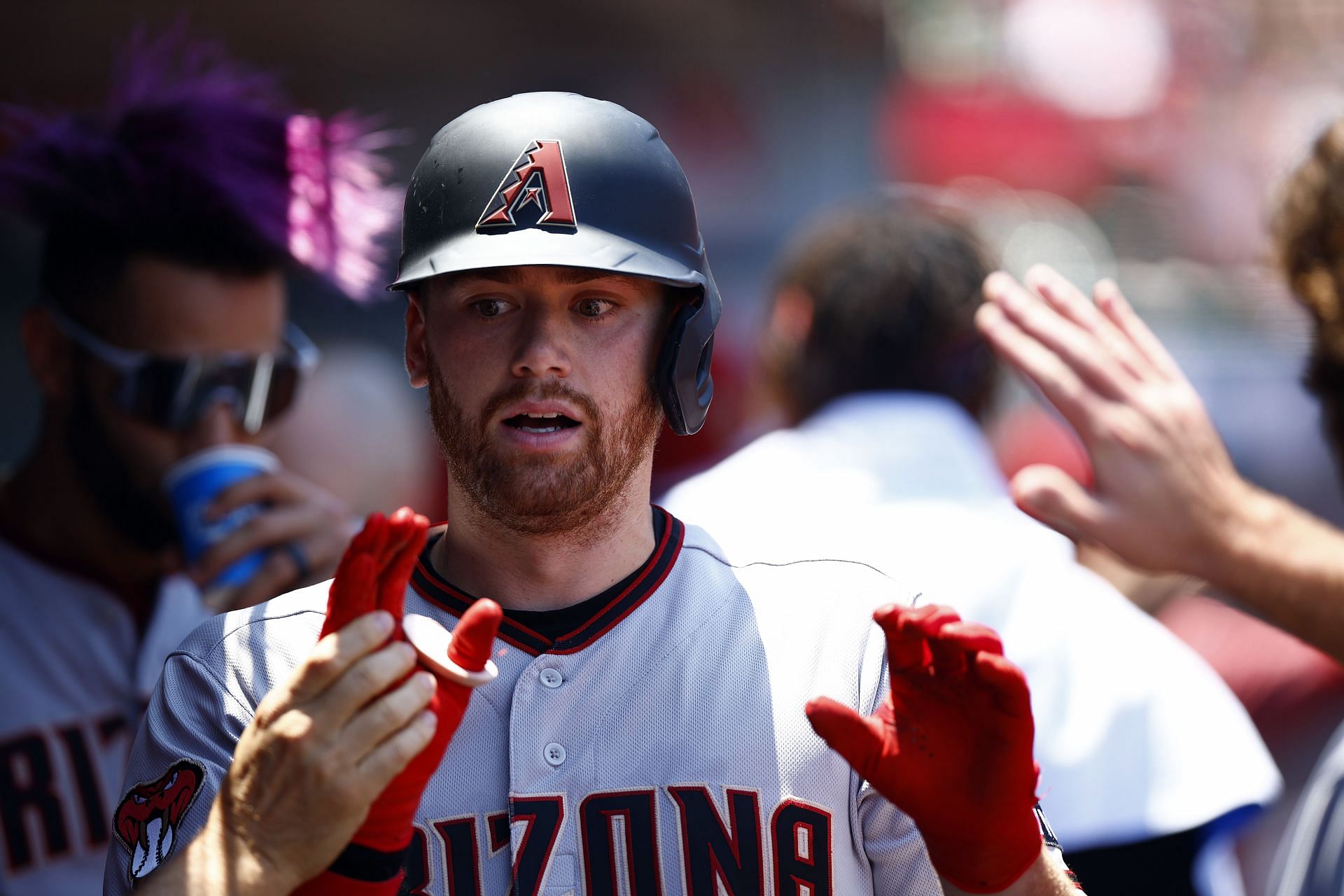 Troy Glaus of the Anaheim Angels holds up the World Series trophy News  Photo - Getty Images