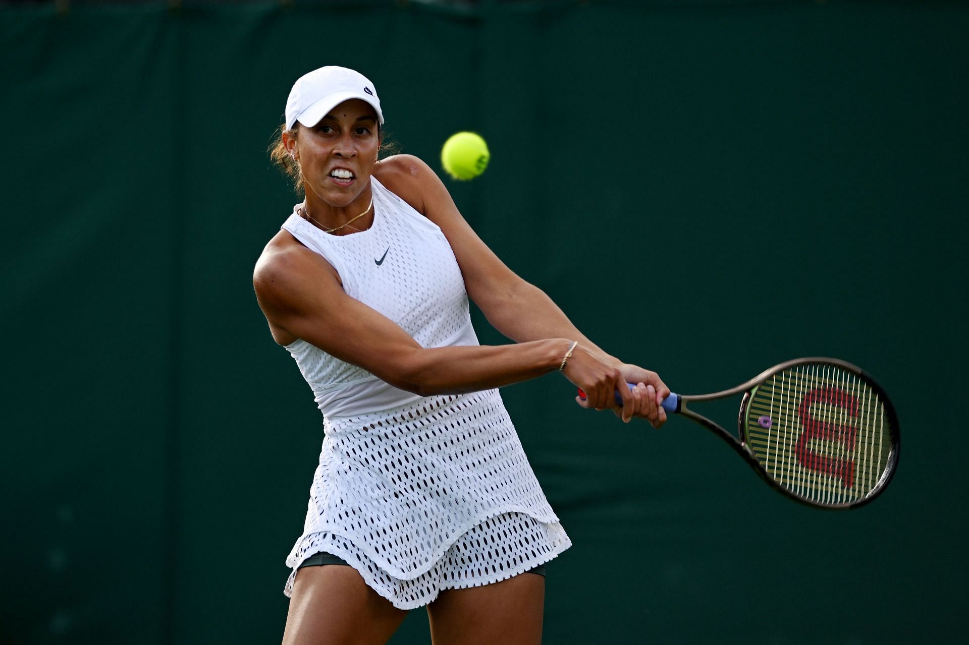 Madison Keys plays a backhand at Wimbledon 2023