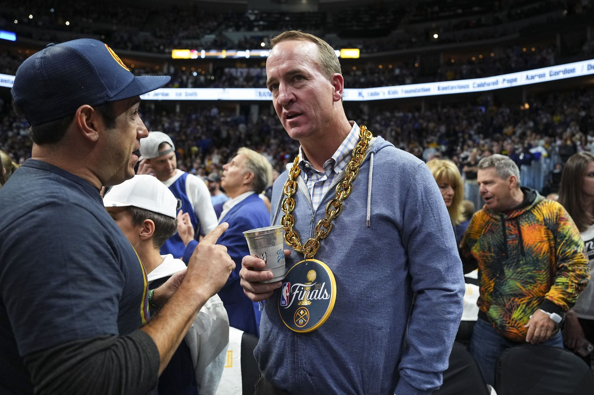 Denver Broncos QB Peyton Manning flashes dance moves, plays with his kids  at practice