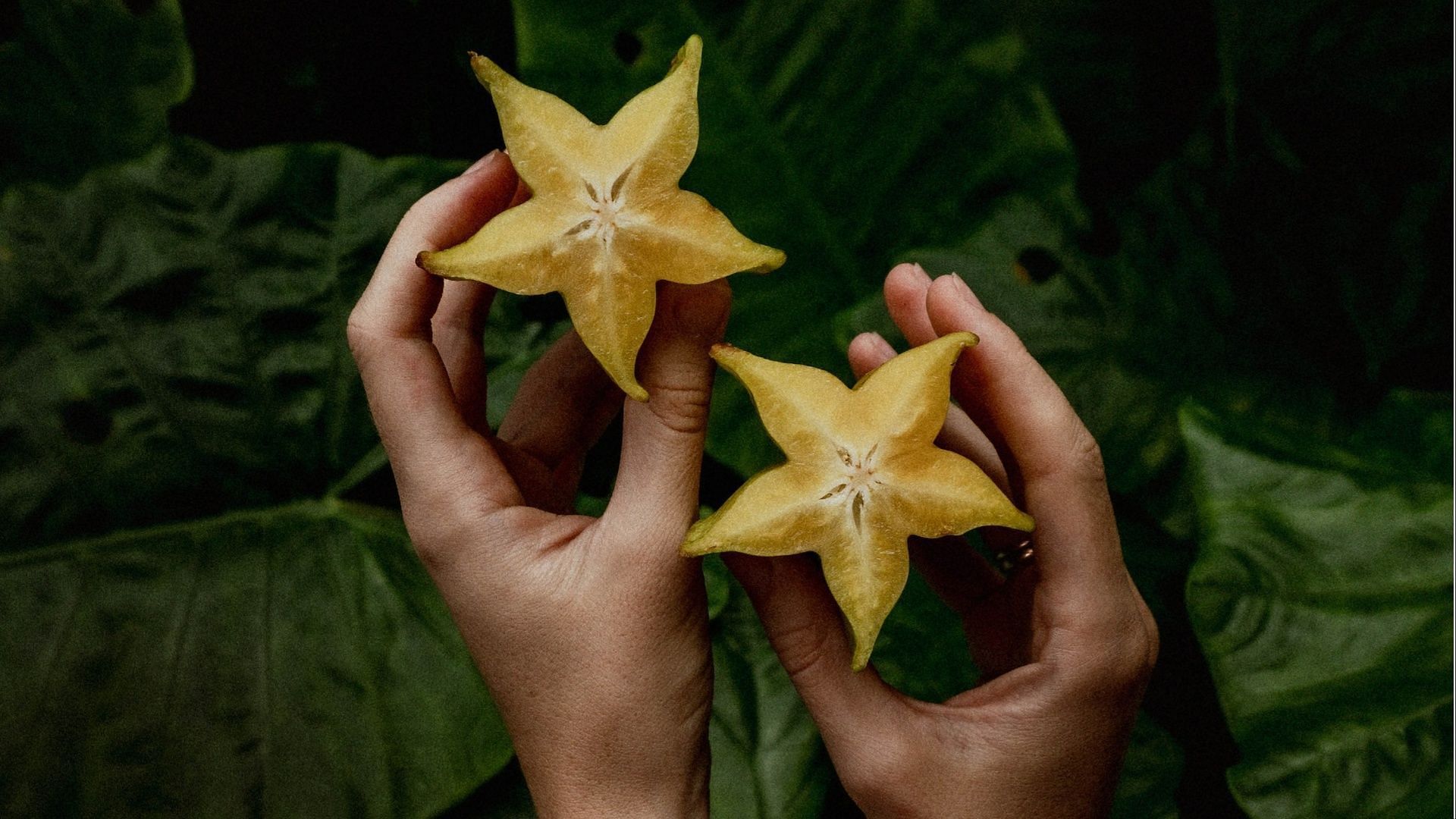 Starfruit resembles a star when cut horizontally. (Photo via Pexels/Iurii Laimin)