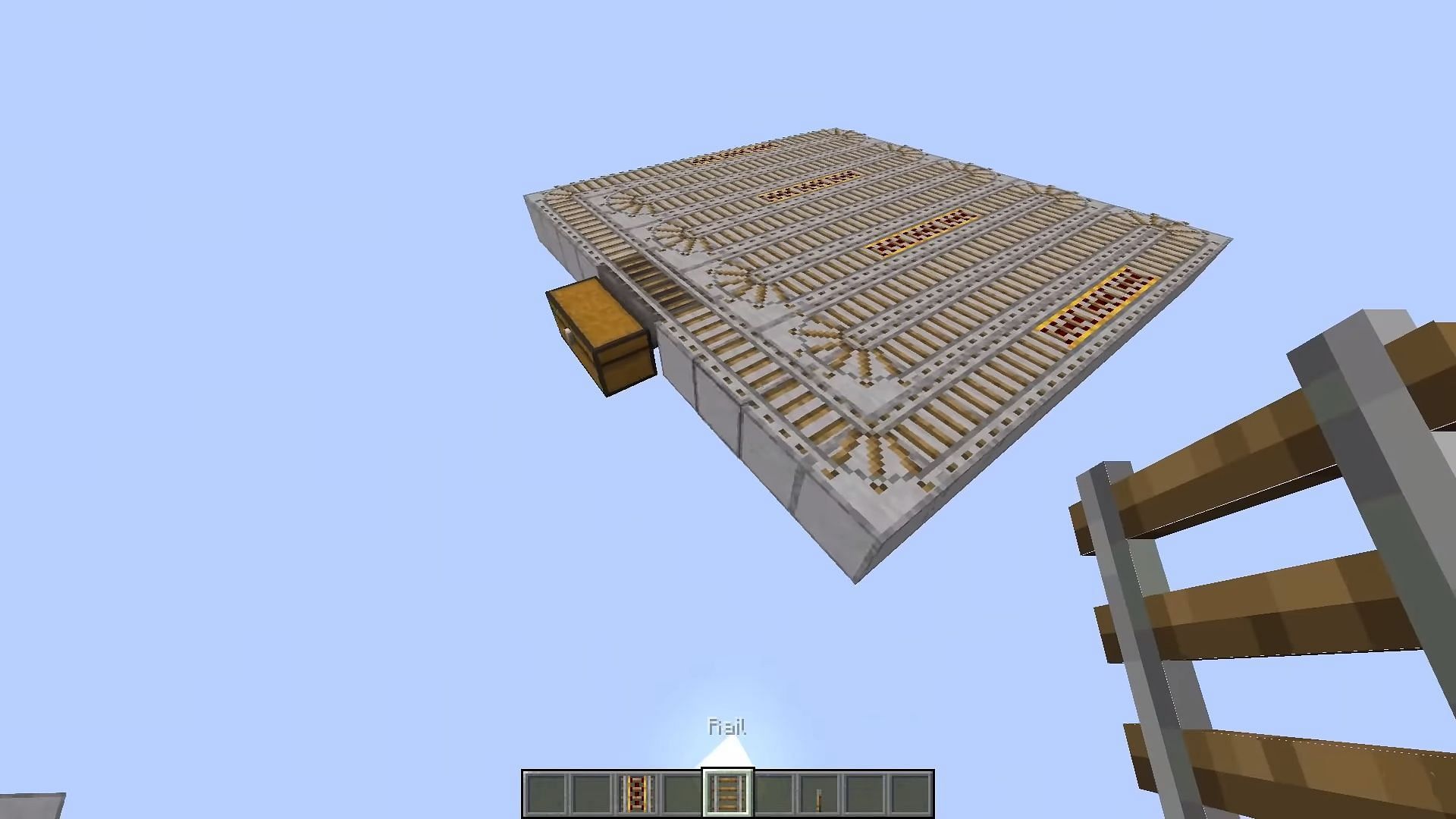 Sniffer farm collection zone with two hoppers, chests, and rails on which minecart with hoppers travel in Minecraft (Image via YouTube/wattles)