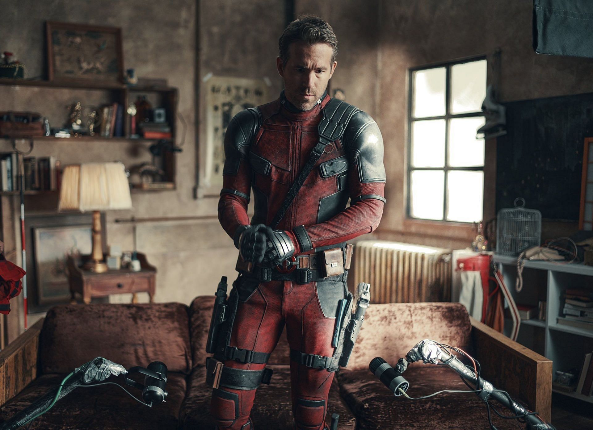 Wade Wilson&#039;s iconic character, played by Ryan Reynolds, gets a fresh look in Deadpool 3 with a noticeably brighter red costume (Image via 20th Century Fox Studios)