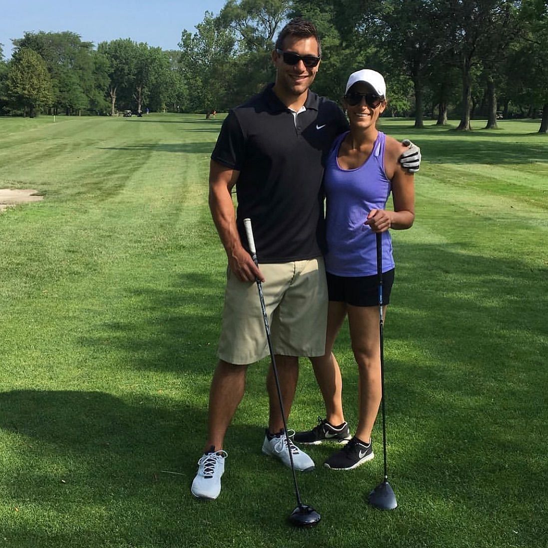 Mike And Briana playing golf