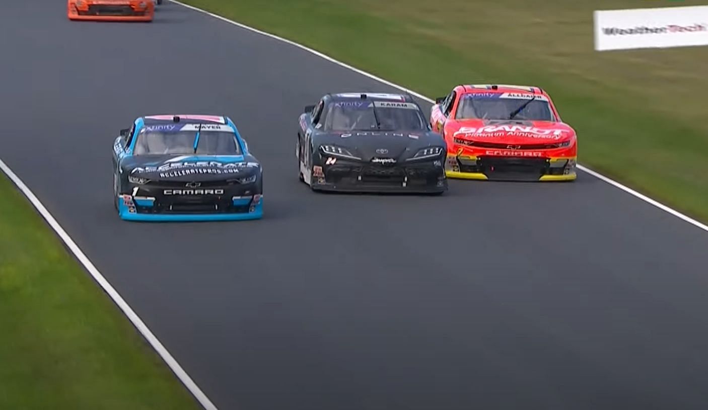 (L-R) Sam Mayer (#1), Sage Karam (#24) and Justin Allgaier (#7) race for the lead in the final laps of the NASCAR Xfinity Series Road America 180 at Road America, Wisconsin. Picture Credits: NBC Sports/YouTube