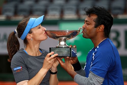 Martina Hingis and Leander Paes with the 2016 French Open trophy.