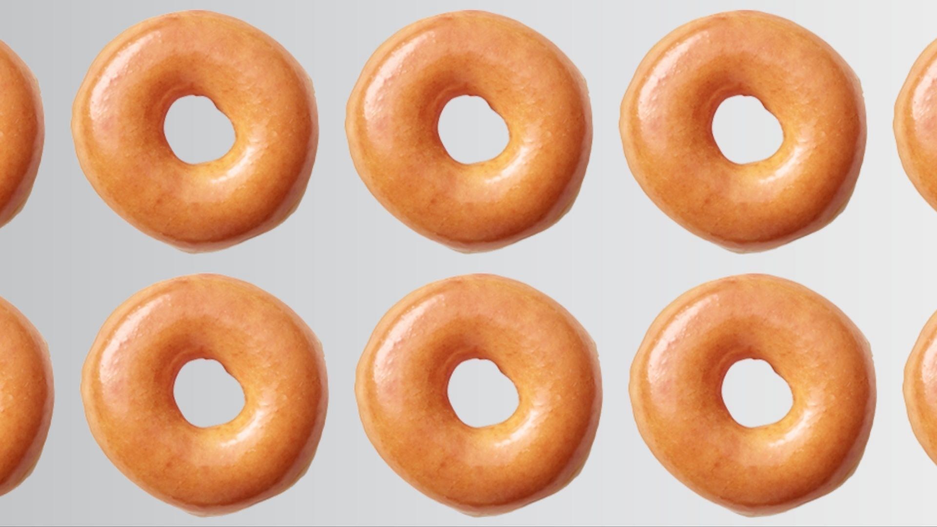 Fans can enjoy a limited-time deal on the fan-favorite Original Glazed&reg; dozens this Friday as the doughnuts and coffeehouse chain celebrates its 86th birthday on July 14 (Image via Krispy Kreme)