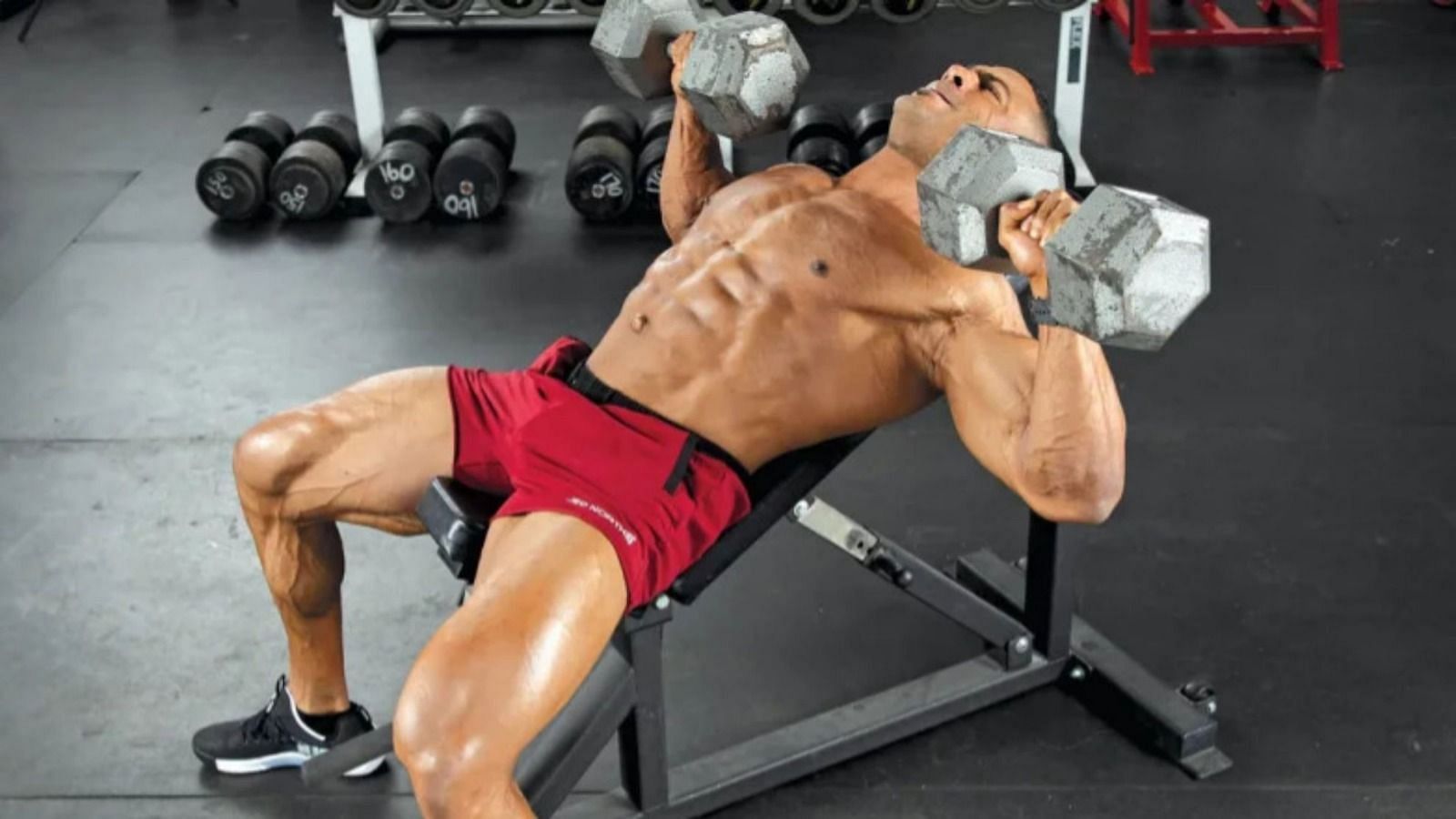 Dumbbell press (Image via Getty Images)