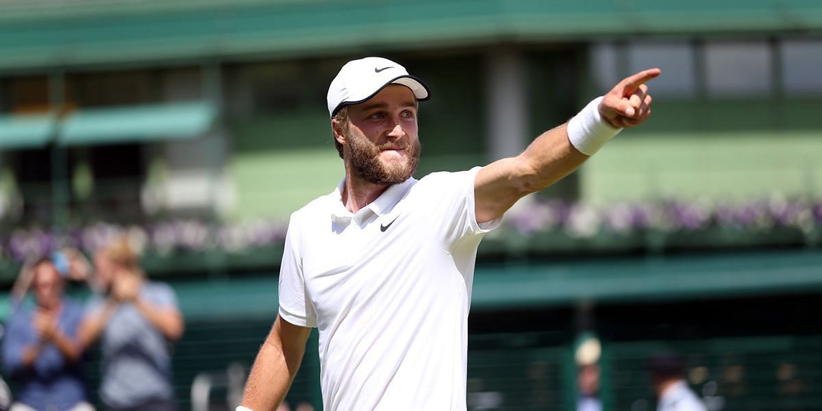 Liam Broady celebrating his second-round victory at Wimbledon