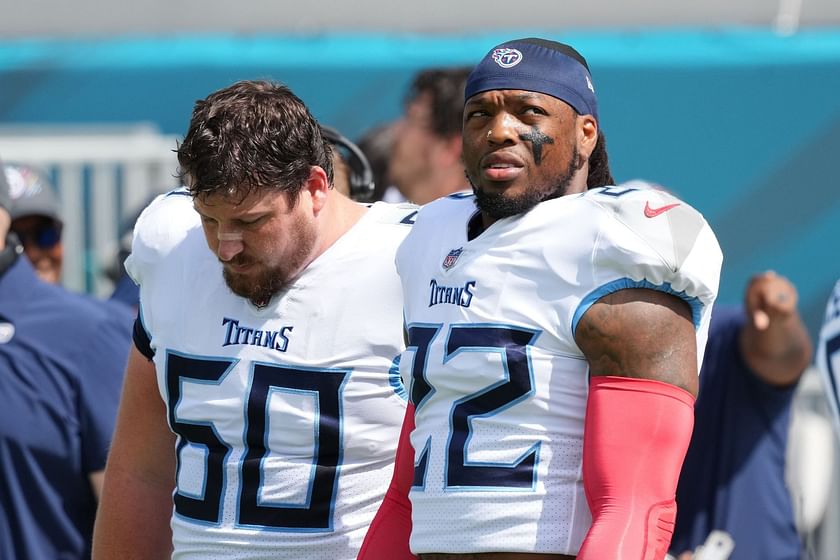 Titans running back Derrick Henry and the crown given to him by a fan