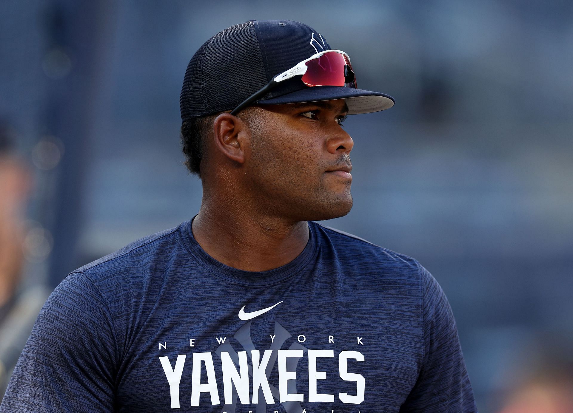 Franchy Cordero #33 of the New York Yankees steps out of the cage during batting practice before the game against the Minnesota Twins at Yankee Stadium on April 13, 2023