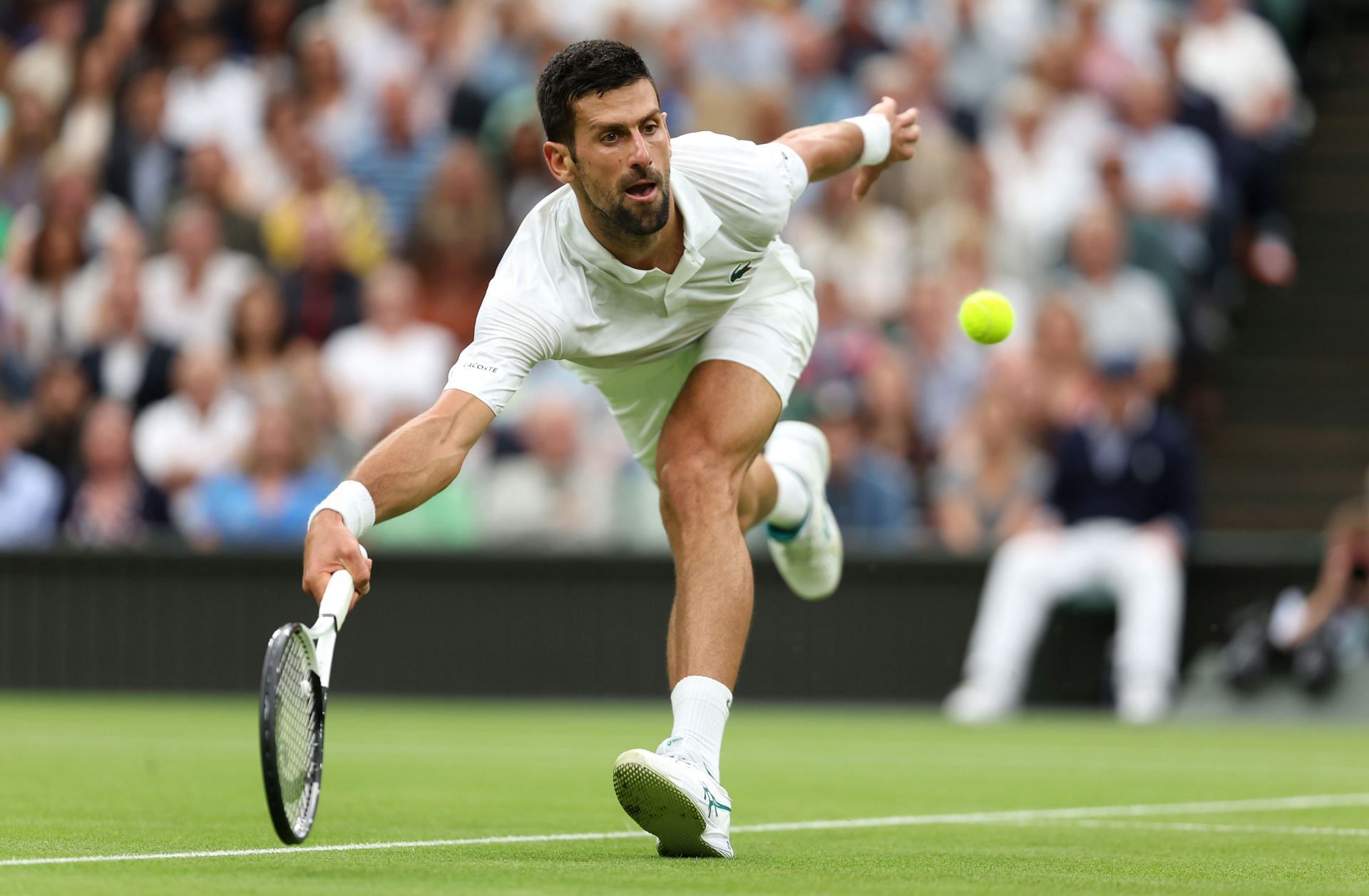 Novak Djokovic in action during his semifinal encounter against Jannik Sinner at Wimbledon