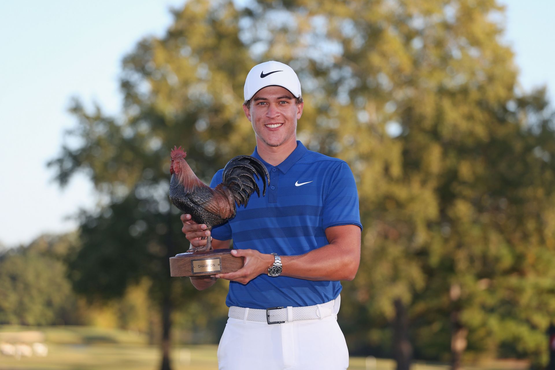 Cameron Champ with the Sanderson Farms Championship trophy in 2018 (via Getty Images)