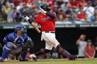 Josh Naylor #22 of the Cleveland Guardians hits a one-run double off Nick Wittgren #64 of the Kansas City Royals during the eighth inning at Progressive Field on July 08, 2023, in Cleveland, Ohio. (Photo by Ron Schwane/Getty Images)