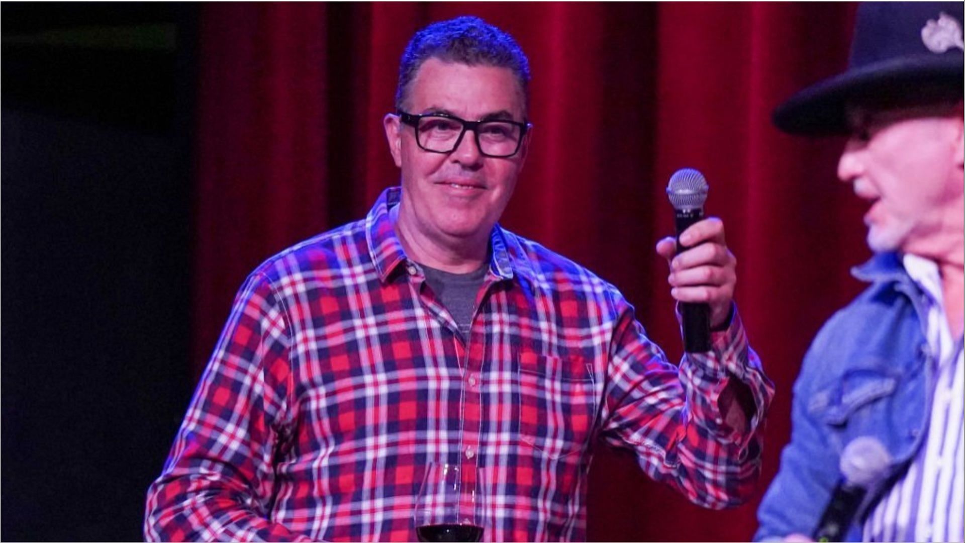 Adam Carolla has earned a lot from his career in radio, film and television (Image via Mickey Bernal/Getty Images)