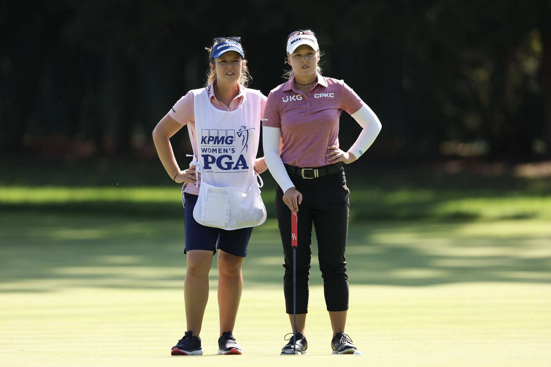 Brooke Henderson of Canada and caddie Brittany Henderson wait to putt on the second green during the final round of the KPMG Women&#039;s PGA Championship 2023