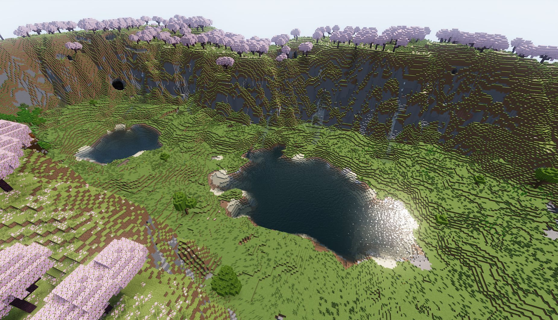 Find a perfect spot to build a fantastic base in between this valley (Image via Mojang)