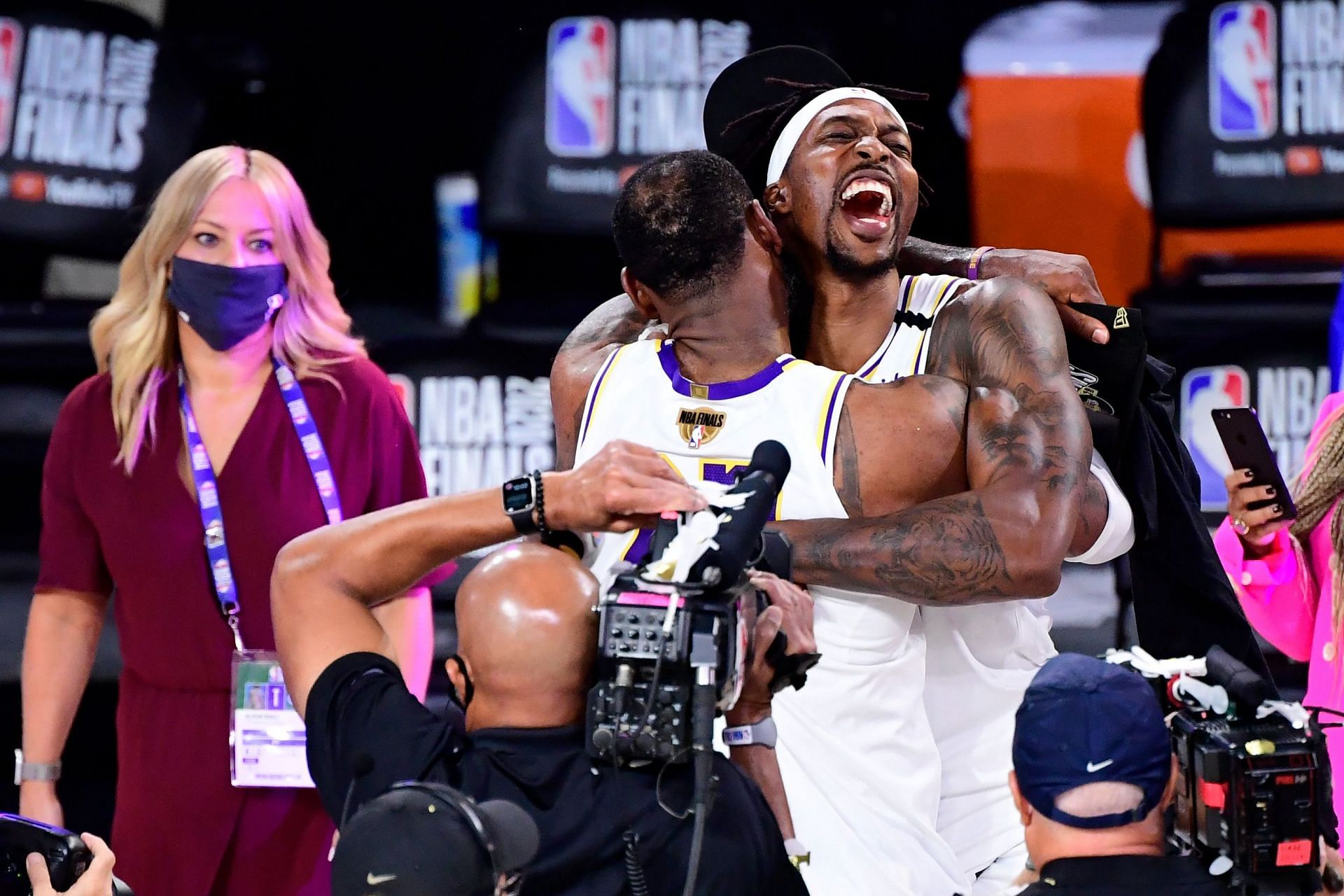 Dwight Howard celebrates with LeBron James after winning the 2020 NBA Finals.