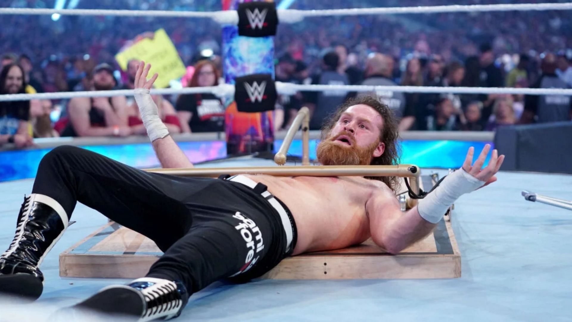 Sami Zayn reacts after losing his match against Johnny Knoxville at WrestleMania 38.