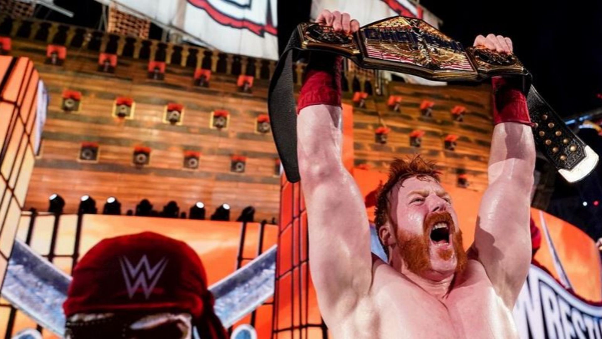 Sheamus poses with the United States Championship after winning it at WrestleMania 37.