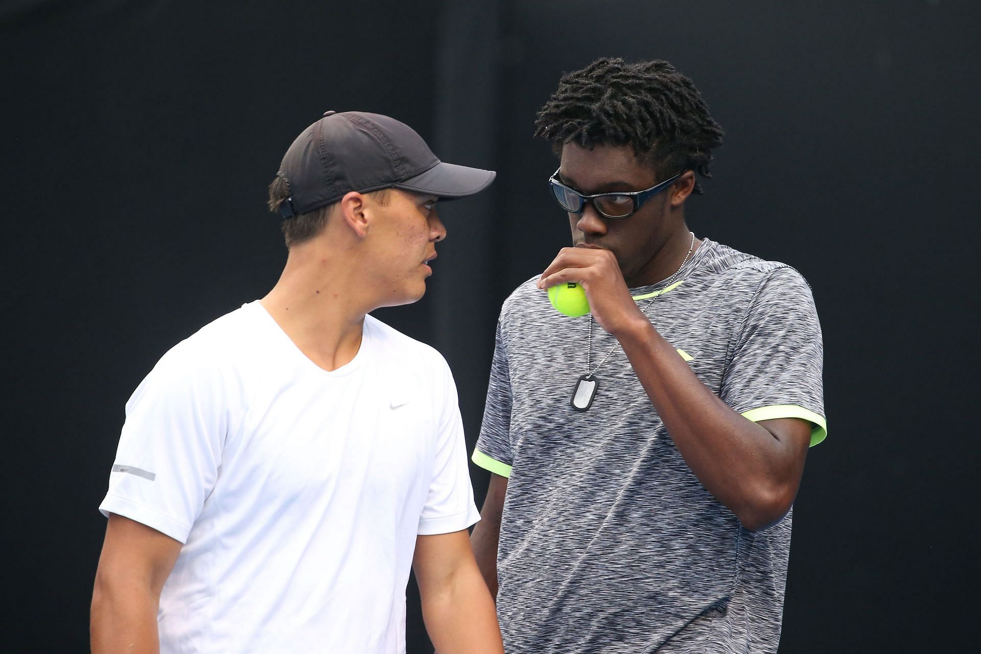 Alafia Ayeni pictured with his doubles partner.