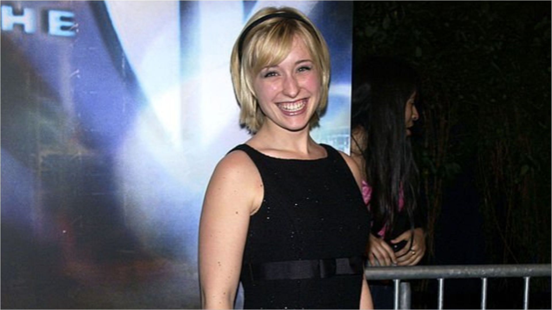 Allison Mack has accumulated a lot of wealth from her career as an actress (Image via Jean-Paul Aussenard/Getty Images)