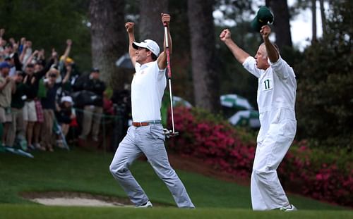 Adam Scott celebrates after his birdie putt on the second playoff hole, which saw him win the Green Jacket, during the final round of the 2013 Masters